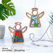 Two wooden angel ornaments with stained glass effects are featured. The left shows a red carnation, and the right depicts a white snowdrop flower from the product "Snowdrop Ornament | 3.5" Angel Figurine | Mother's Angels®" by Forged Flare®. They are displayed on a white surface with green leaves in the background. A text reads "January Birth Flower: Carnation & Snowdrop.