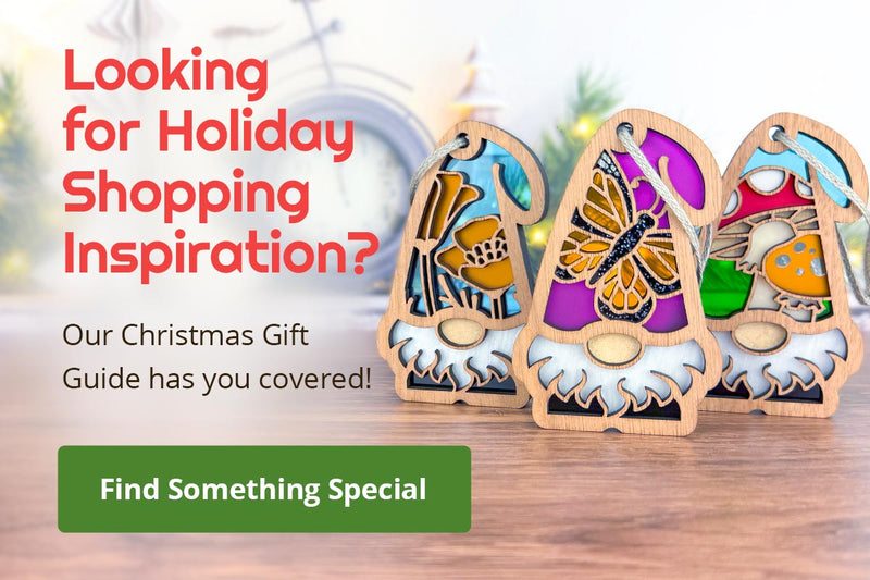 A holiday shopping banner featuring colorful wooden gnome figures and a message: "Looking for Holiday Shopping Inspiration? Our Christmas Gift Guide has you covered!" There's a button labeled "Find Something Special."