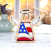 The wooden angel ornament is expertly crafted from sapele wood and vibrant colors. This design features an American flag motif, making it an ideal choice for police retirement gifts. The combination of the rich wood texture and the vivid colors of the flag creates a striking and meaningful keepsake. This handcrafted piece honors the service and dedication of retiring police officers, providing a heartfelt and patriotic tribute to their commitment and bravery.