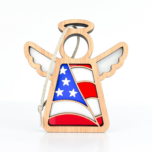 Handcrafted American flag ornament featuring vibrant red, white, and blue colors, carefully arranged to depict the iconic stars and stripes of the United States flag. The ornament is crafted from rich sapele wood, adding warmth and a touch of natural beauty. Perfectly designed to catch the sunlight, this patriotic piece comes alive with brilliant colors when displayed in a well-lit area. Ideal for showing national pride and adding a touch of handcrafted artistry to any home decor.