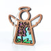 The Purple Orchid Ornament from Forged Flare® is a 3.5" wooden angel figurine featuring a carved floral design, making it a perfect addition to your Mother's Angels® collection. This angel has outstretched wings and includes a loop at the top for easy hanging. The intricate floral pattern showcases purple flowers with green stems, set against light blue hollowed-out sections.