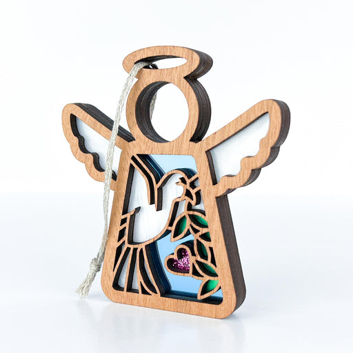 Peace dove ornament with a white dove bird and a glittering heart, perfect for memorial gifts.