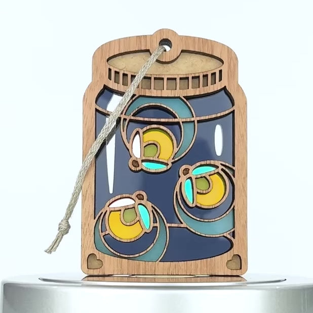 A 360 degree view of the  jar of fireflies ornament.