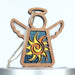 A wooden angel ornament with outstretched wings and a halo. The angel's torso features a captivating cut-out design showcasing a celestial sun against a blue glittery background. It includes a light-colored hanging string attached to the top.